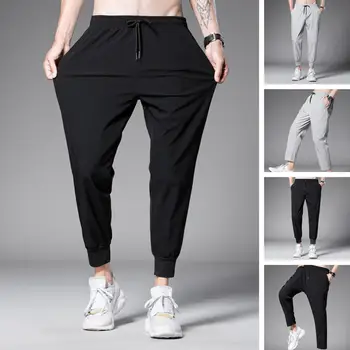 Модерни мъжки панталони джобове пот абсорбиращи бързо сушене мъже широк крак тичане хлабав sweatpants